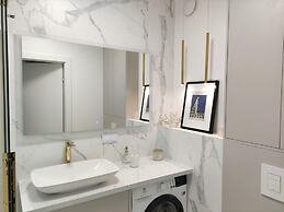 A Comfortable Apartment With a Swimming Pool and Sauna in Dziwnow for 