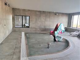 A Comfortable Apartment With a Swimming Pool and Sauna in Dziwnow for 