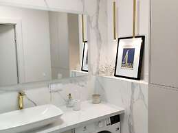 A Comfortable Apartment With a Swimming Pool and Sauna in Dziwnow for 