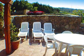 Holiday Home in Porto Pollo With Garden