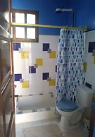 La casa de piedra y colores