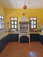 La casa de piedra y colores