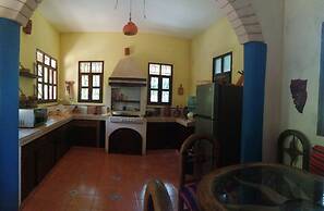 La casa de piedra y colores