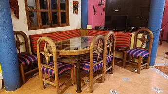 La casa de piedra y colores