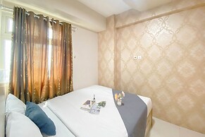 Tranquil And Homey 2Br At Apartment Green Pramuka City