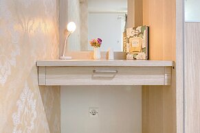 Tranquil And Homey 2Br At Apartment Green Pramuka City