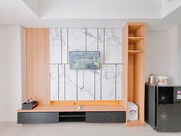 Homey And Relaxing Studio Patraland Amarta Apartment