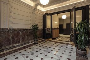 Batimont Suites & Apartments