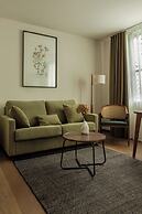 Batimont Suites & Apartments