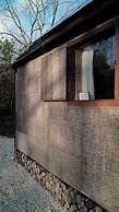 Off-grid Cork Cabin With It's Own Island