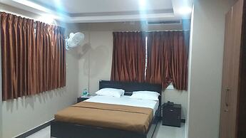 the Nisarga Grand   boarding & lodging