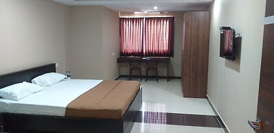 the Nisarga Grand   boarding & lodging