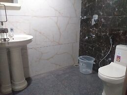 the Nisarga Grand   boarding & lodging