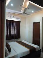 the Nisarga Grand   boarding & lodging