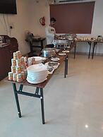 the Nisarga Grand   boarding & lodging