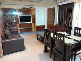 the Nisarga Grand   boarding & lodging