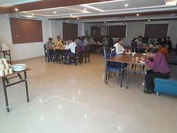 the Nisarga Grand   boarding & lodging