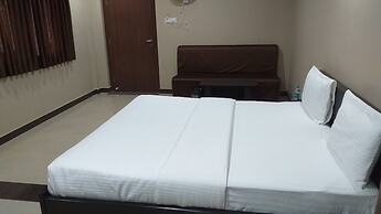 the Nisarga Grand   boarding & lodging