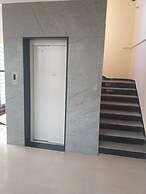 the Nisarga Grand   boarding & lodging