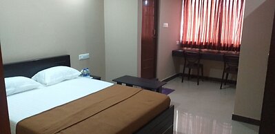 the Nisarga Grand   boarding & lodging