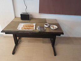 the Nisarga Grand   boarding & lodging