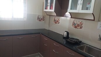 the Nisarga Grand   boarding & lodging