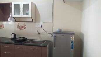 the Nisarga Grand   boarding & lodging