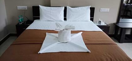 the Nisarga Grand   boarding & lodging