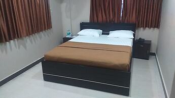 the Nisarga Grand   boarding & lodging