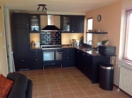 Bungalow in Breskens With Waterfront Jetty