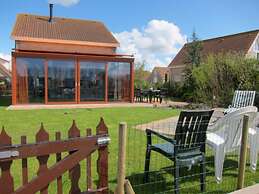 Bungalow in Breskens With Waterfront Jetty