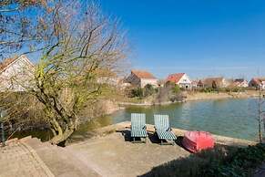 Pleasant Holiday Home on the Water