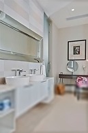 Gorgeous Beach House Perched Right Over the Ocean