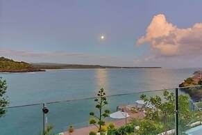 Gorgeous Beach House Perched Right Over the Ocean