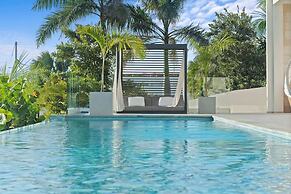 Gorgeous Beach House Perched Right Over the Ocean