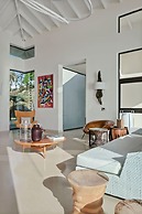 Gorgeous Beach House Perched Right Over the Ocean