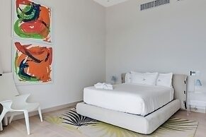 Gorgeous Beach House Perched Right Over the Ocean