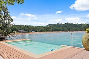 Gorgeous Beach House Perched Right Over the Ocean