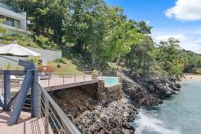 Gorgeous Beach House Perched Right Over the Ocean