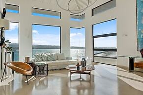 Gorgeous Beach House Perched Right Over the Ocean