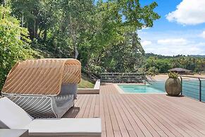 Gorgeous Beach House Perched Right Over the Ocean