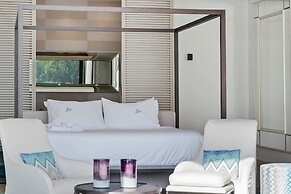 Gorgeous Beach House Perched Right Over the Ocean