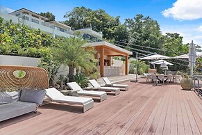 Gorgeous Beach House Perched Right Over the Ocean