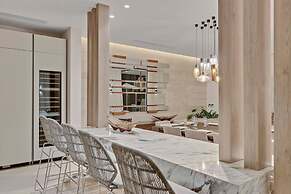 Gorgeous Beach House Perched Right Over the Ocean