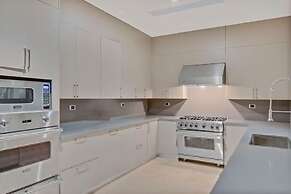 Gorgeous Beach House Perched Right Over the Ocean