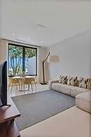 Gorgeous Beach House Perched Right Over the Ocean