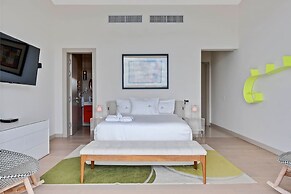 Gorgeous Beach House Perched Right Over the Ocean