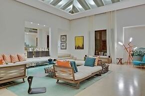 Gorgeous Beach House Perched Right Over the Ocean