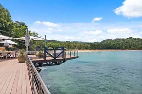 Gorgeous Beach House Perched Right Over the Ocean