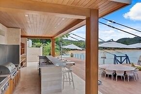Gorgeous Beach House Perched Right Over the Ocean
